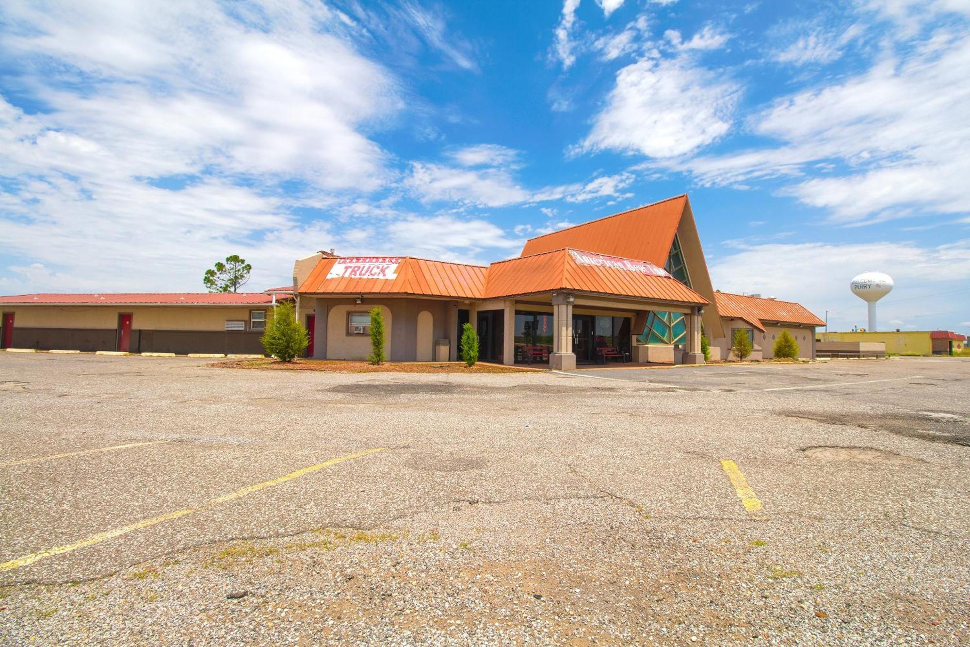 American Best Inn By Oyo I-35 Perry Near Lake Mcmurtry Bagian luar foto